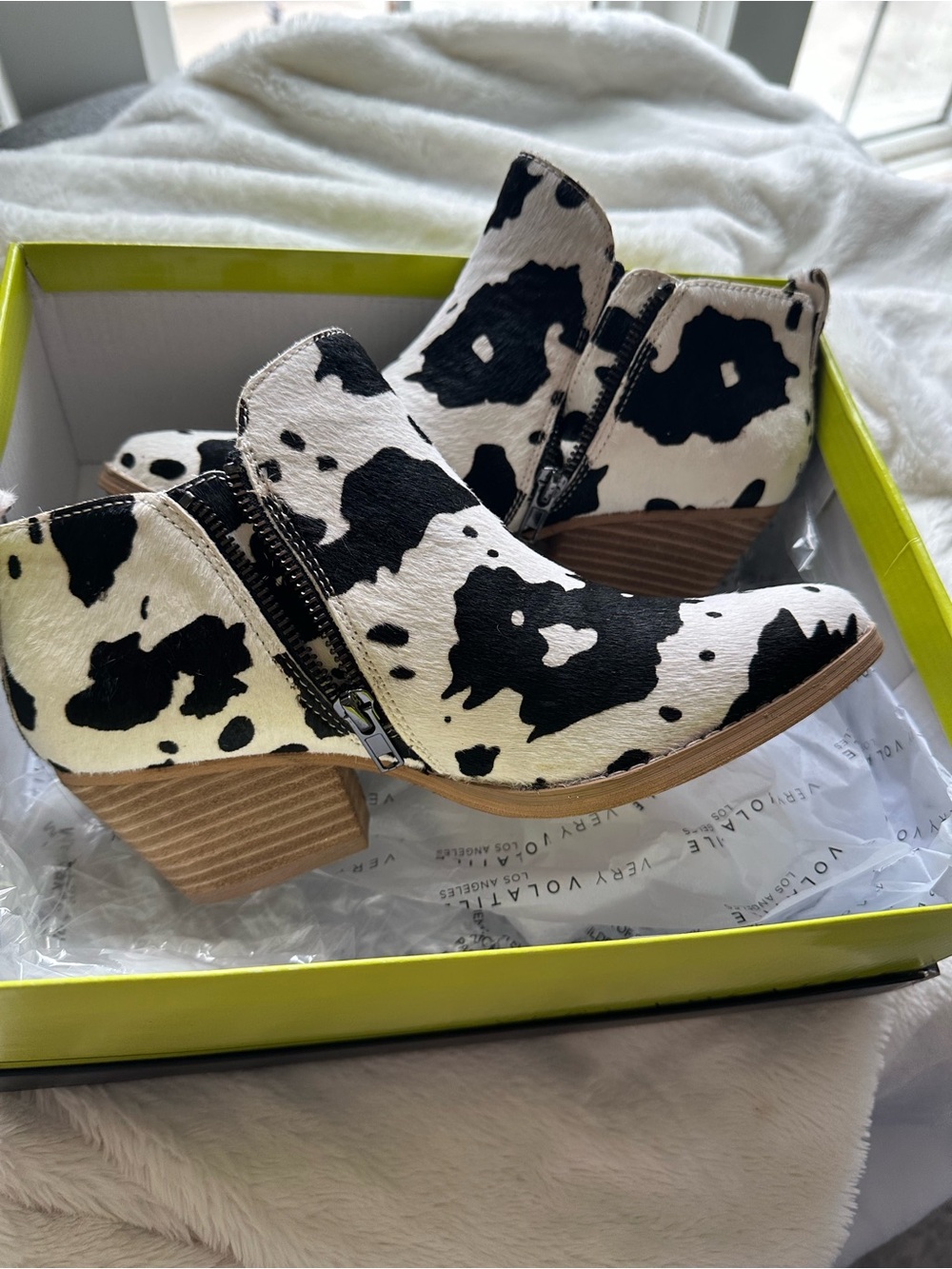 Very Volatile Cow-Print Ankle Booties in Black & White